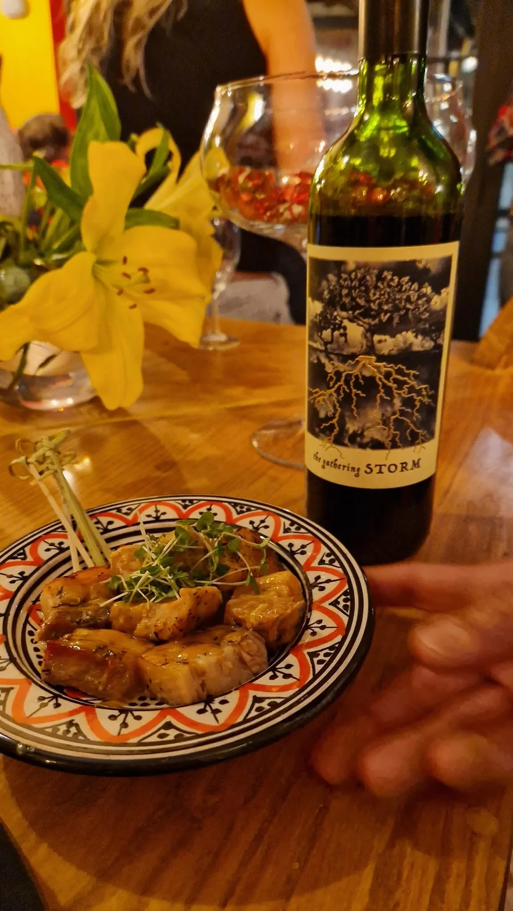 A warm tapas plate with wine at Bodega 19